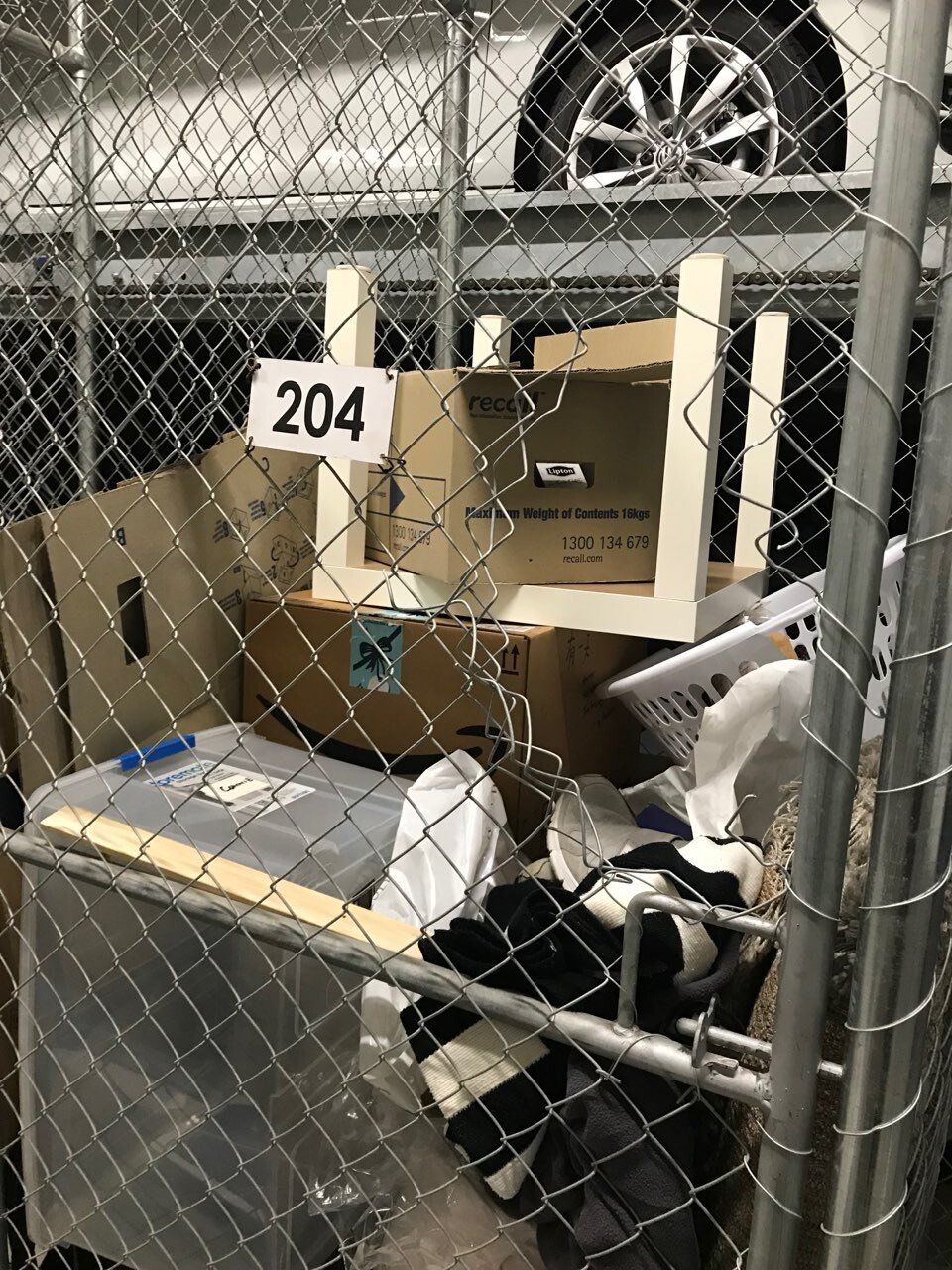 Damaged chain mesh storage cage