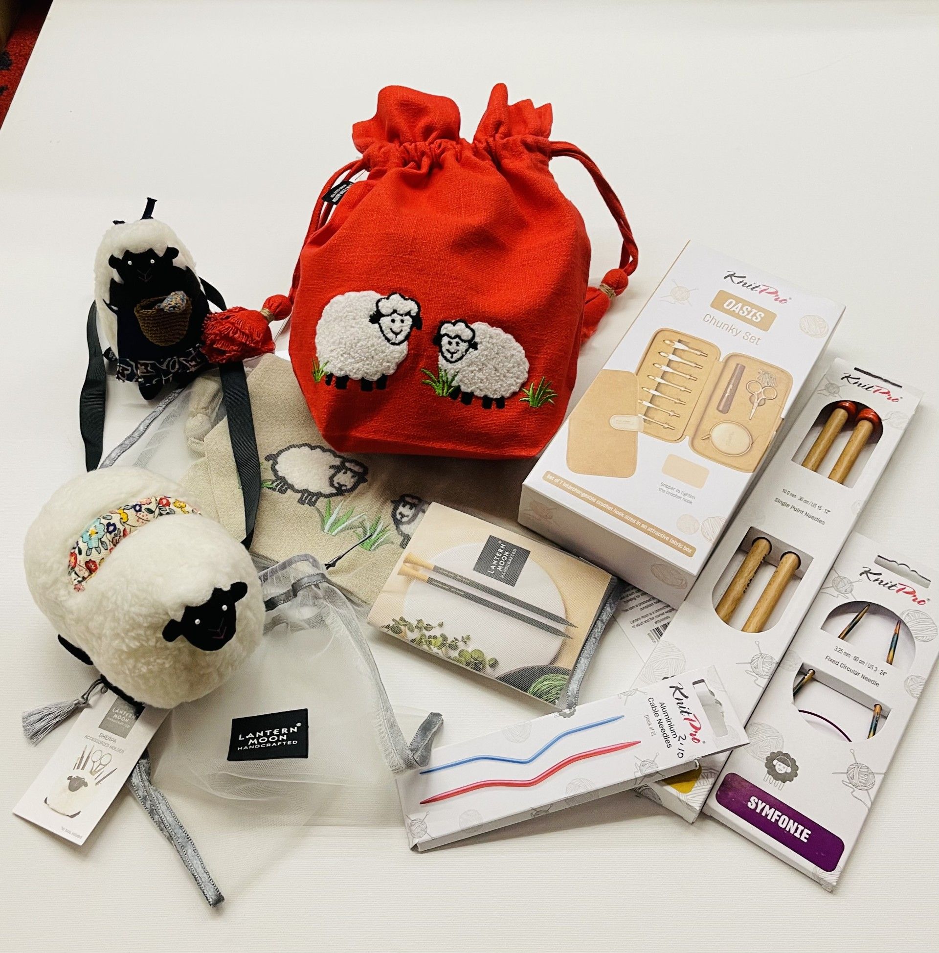 A selection of sheep themed knitting accessories 