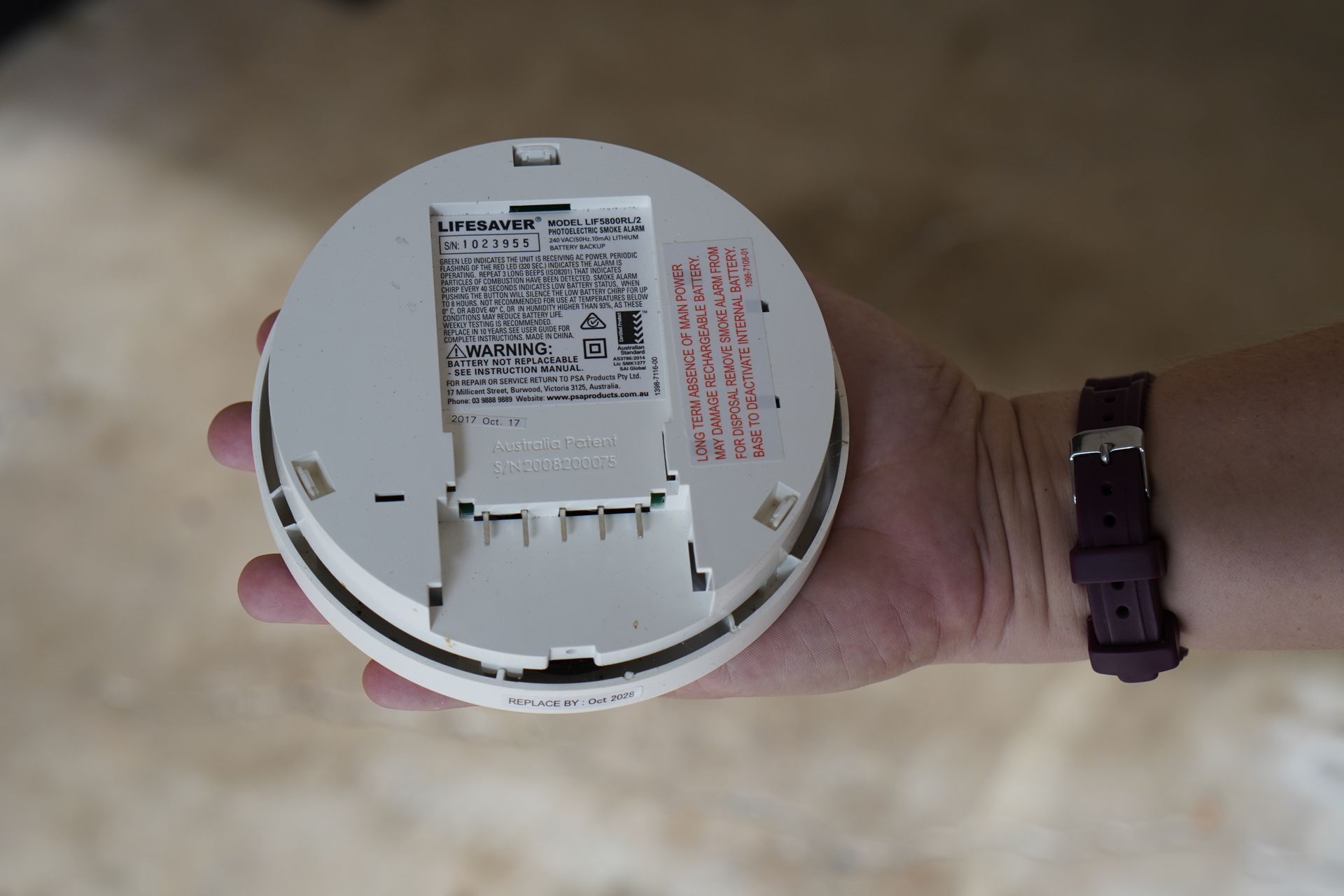 Installing photoelectric smoke alarms in a Sunshine Coast home with Smoke Alarmed