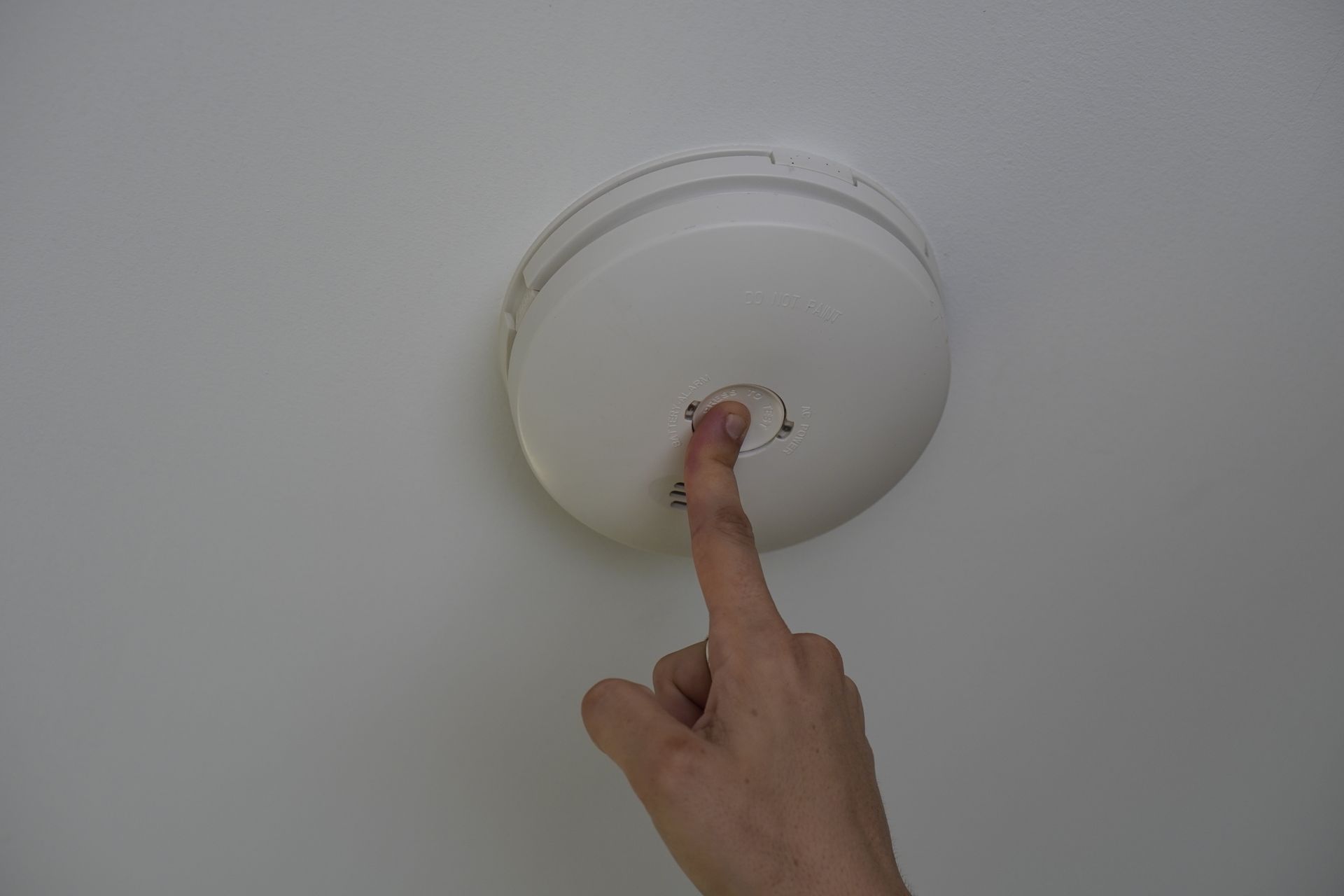 Pressing Smoke Alarm Test Button