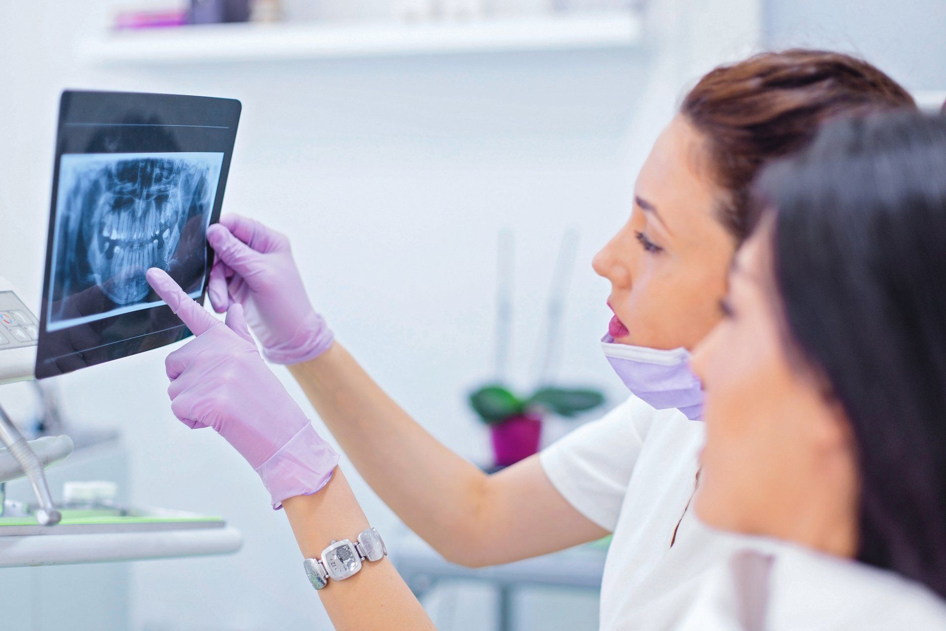dentist explaining xray to patient