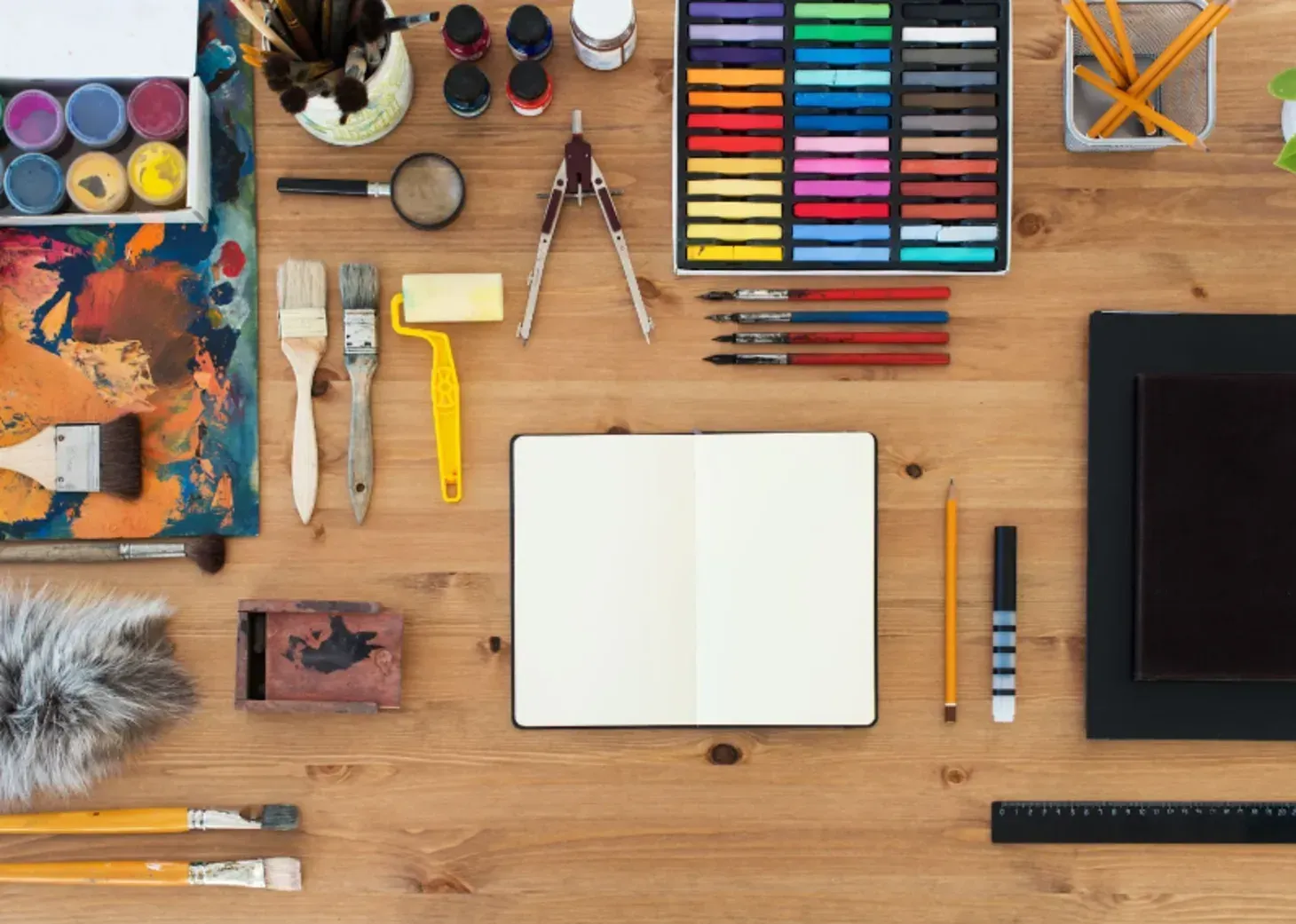 a table full of art supplies