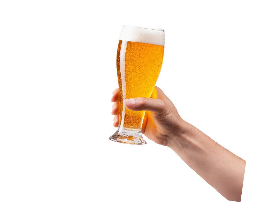 Hand holding a tall glass of golden beer with a foamy head.