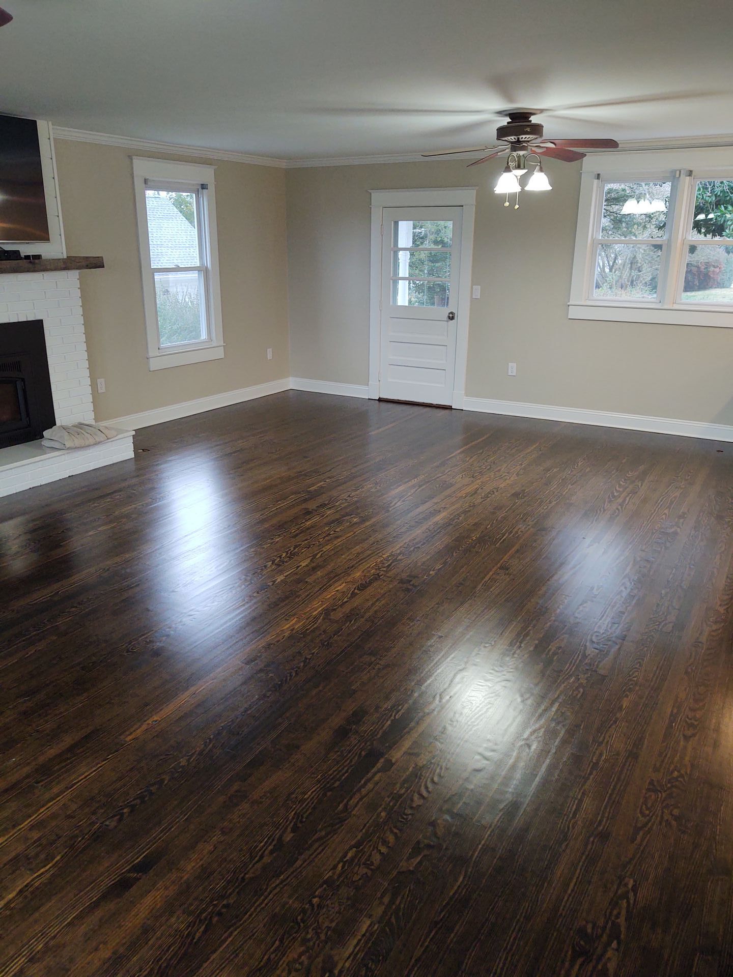 living area with fireplace and new  hardwood floors