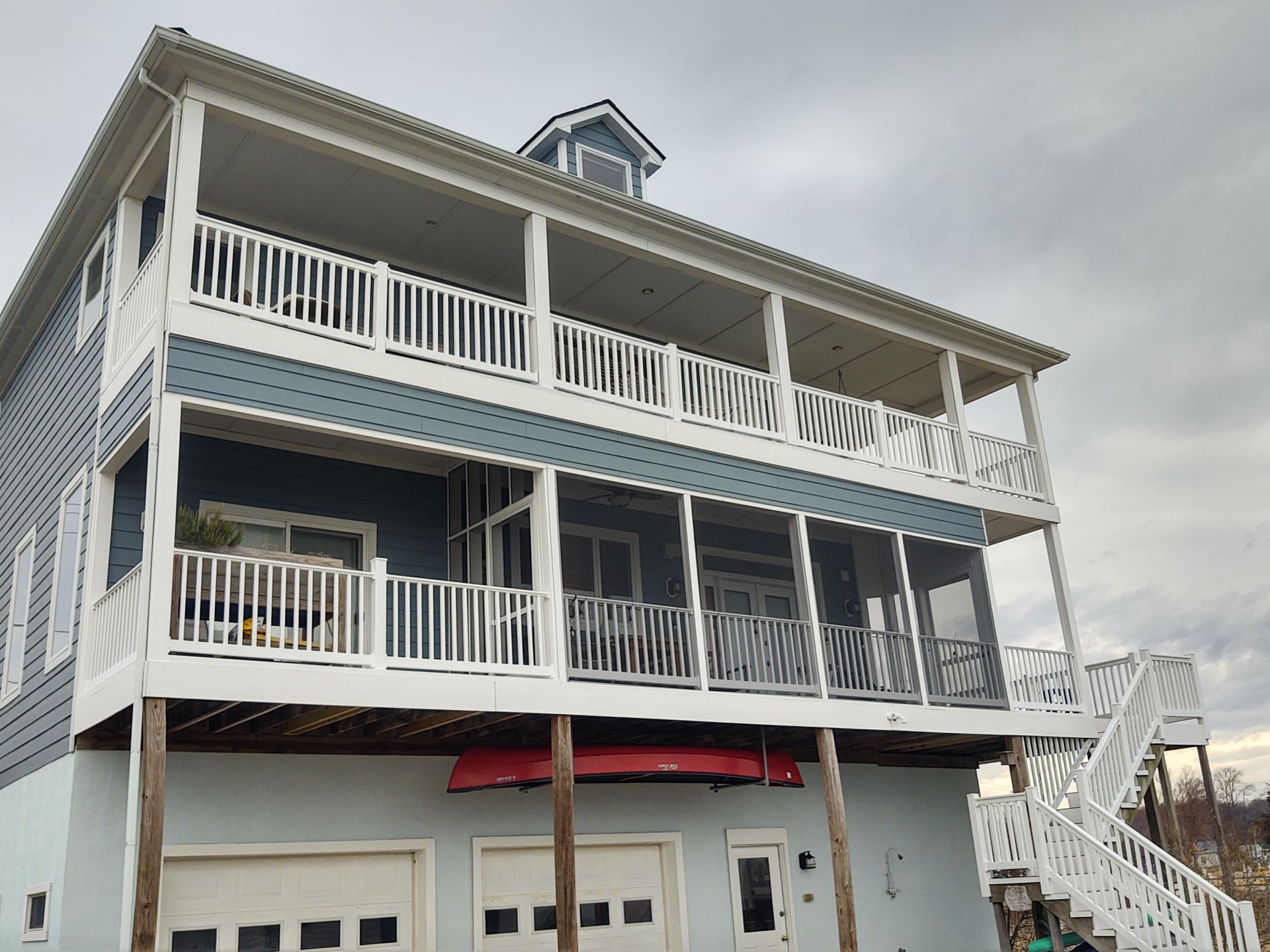 front of 3-story house with screened porch