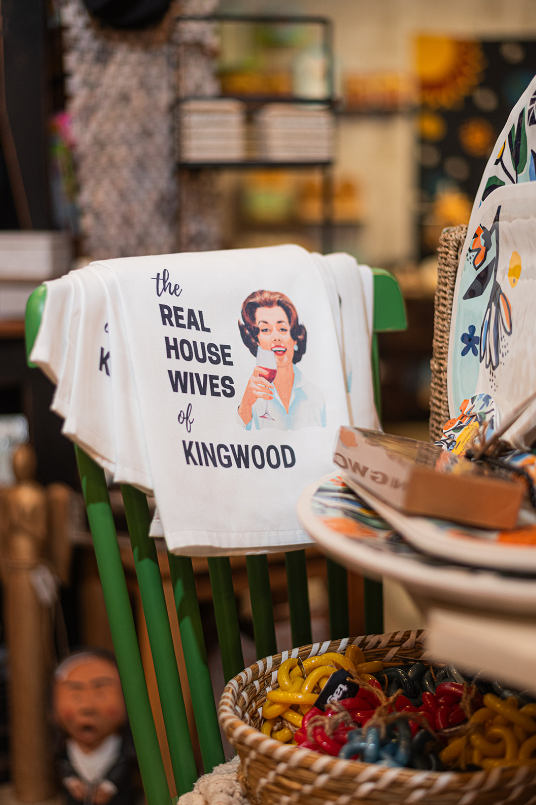 A white tea towel with text 