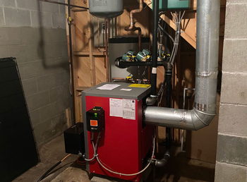 A home high energy efficient furnace in a basement