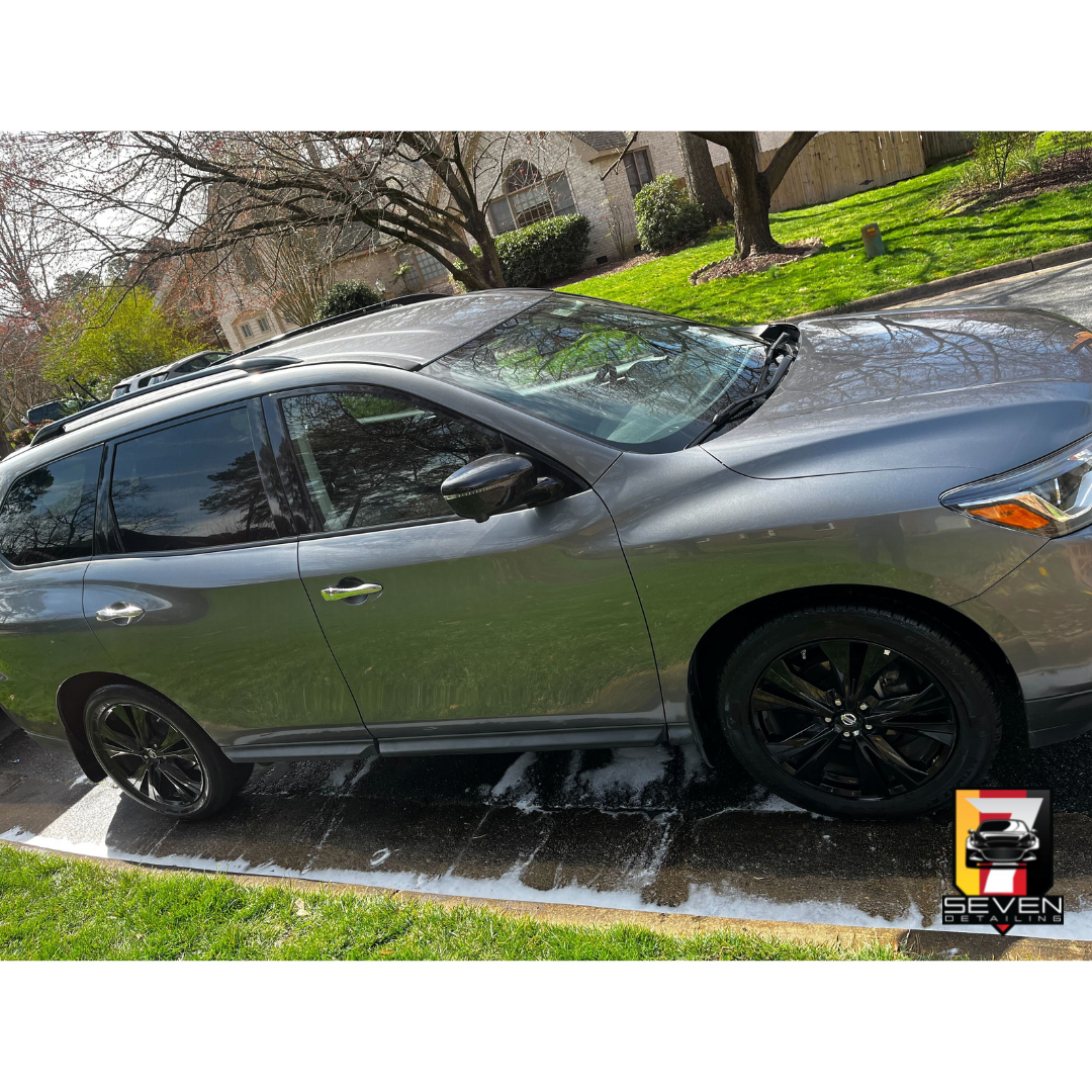 A gray, SUV, detailed by a mobile detailing company.