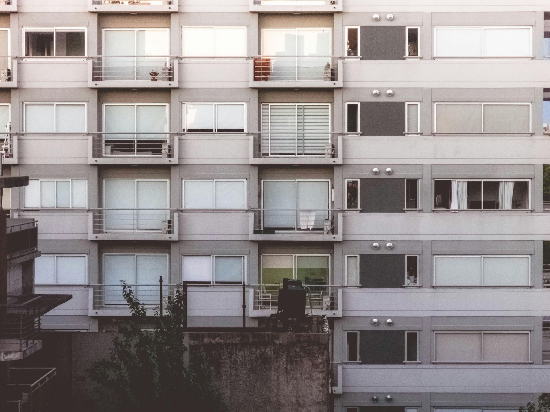 A building with a lot of windows and balconies