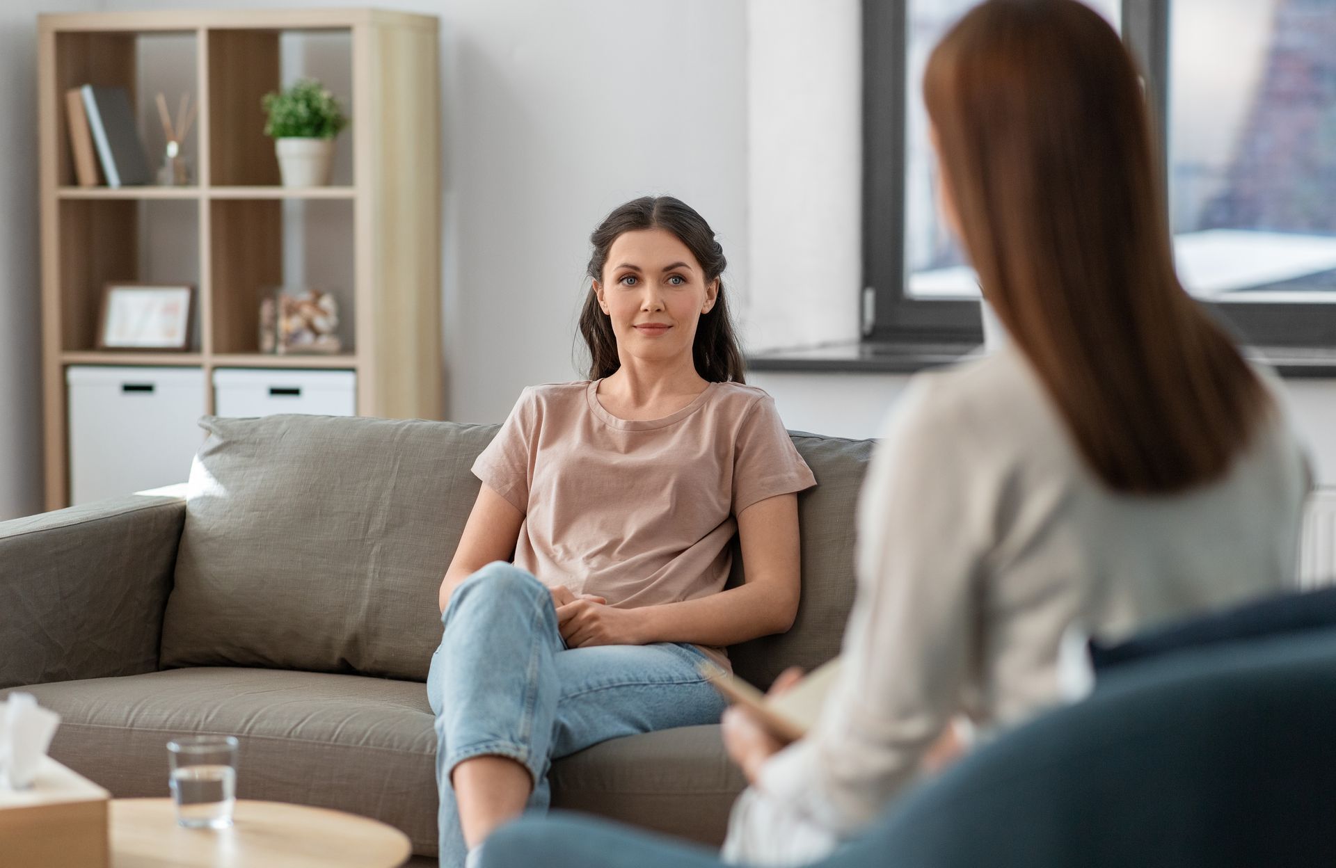 Female counselor offers consolation and advice. Female counselor offers consolation and advice.