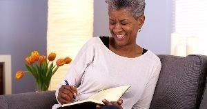 Woman Writing on Journal – Anchorage, AK – Counseling Solutions of Alaksa LLC Woman Writing on Journal – Anchorage, AK – Counseling Solutions of Alaksa LLC