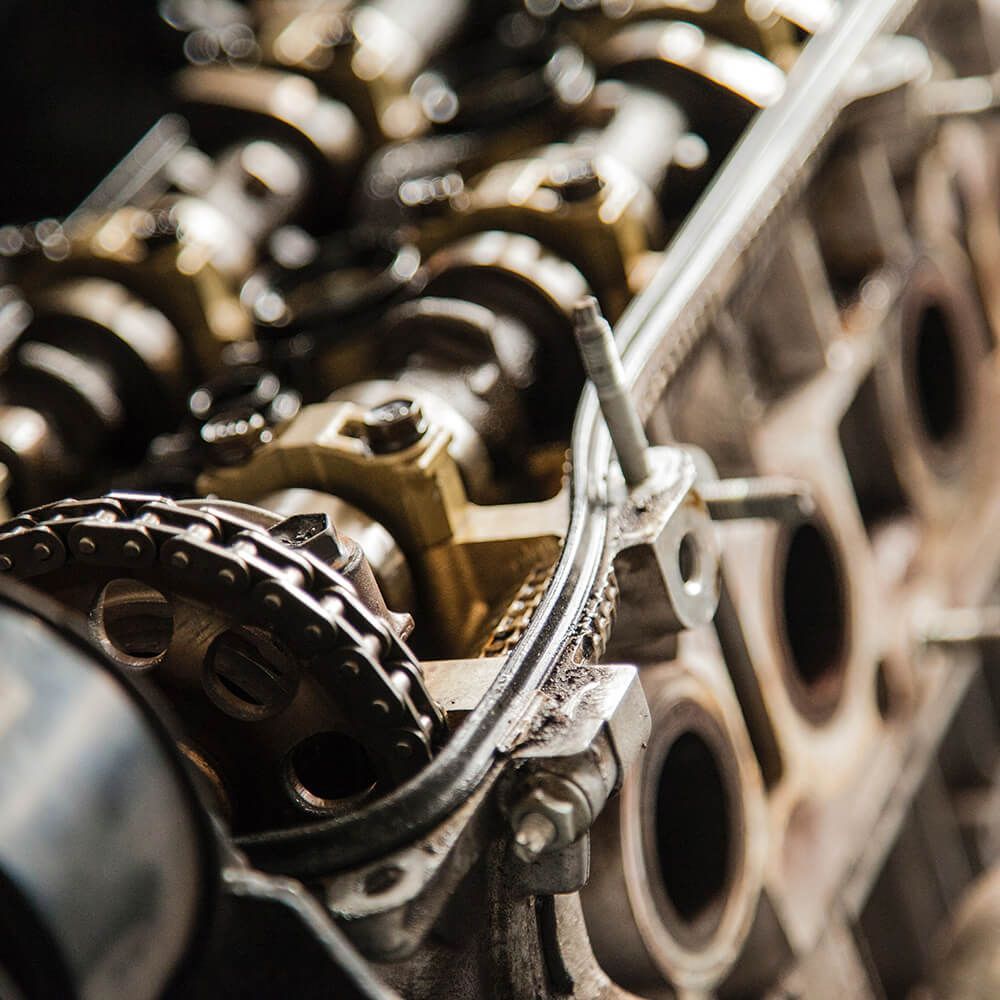 A close up of the inside of a car engine