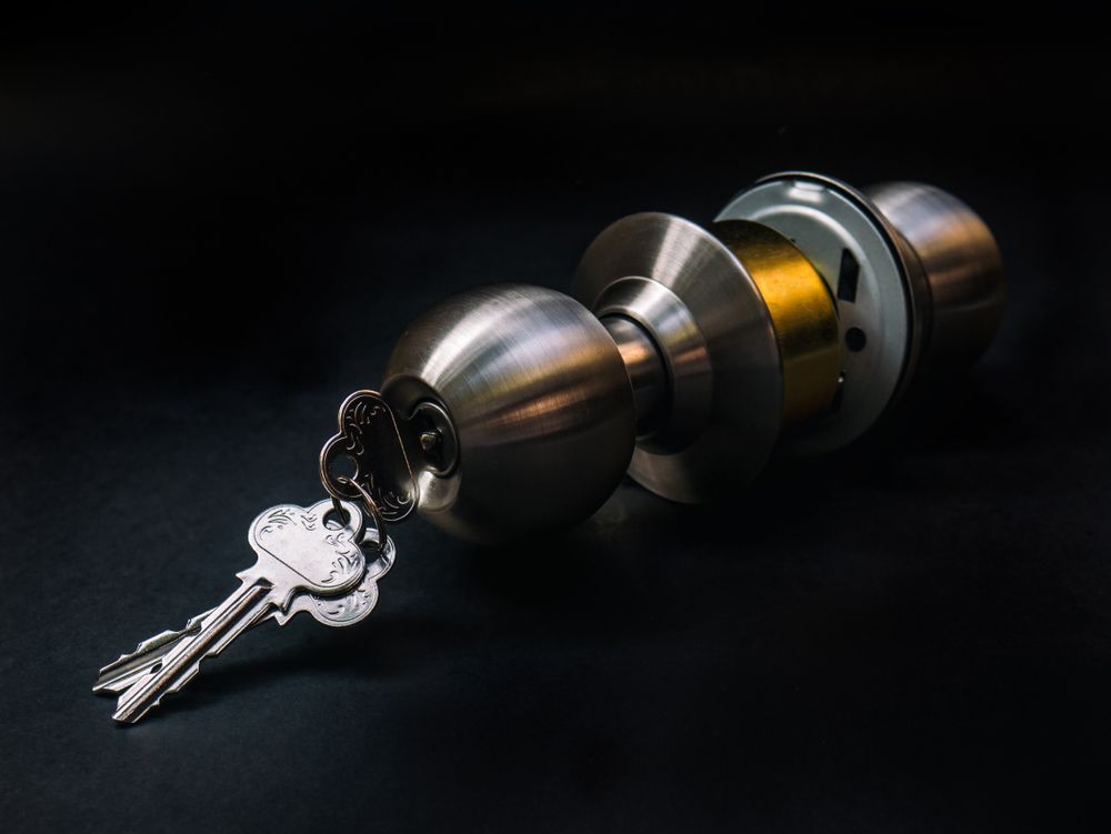 New Entrance Lock With Key on Black Background in Mermaid Beach, QLD