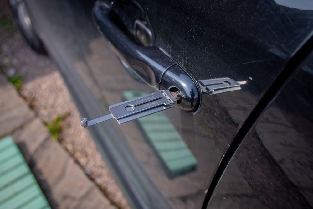 Key of car on handle — Locksmith in Robina, QLD