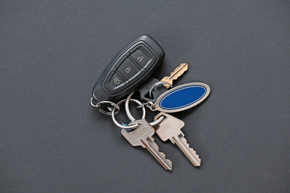 House keys on a car remote fob — Locksmith in Clear Island Waters, QLD