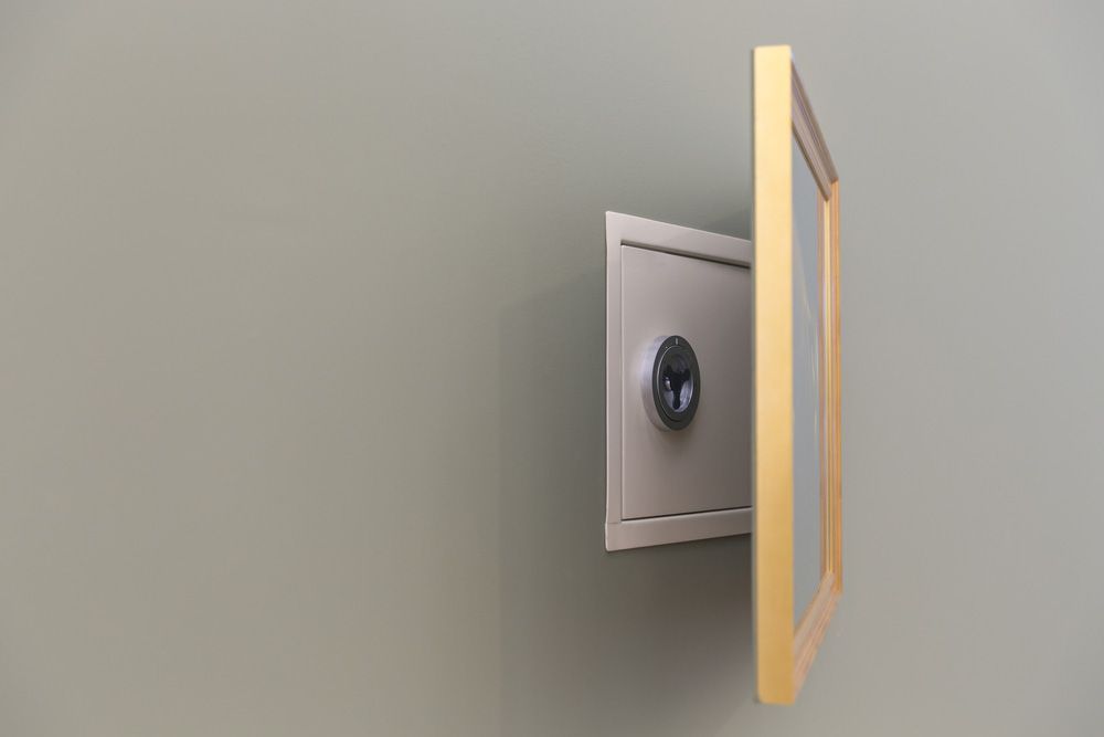 Wall safe hidden over painting — Locksmith in Ashmore, QLD