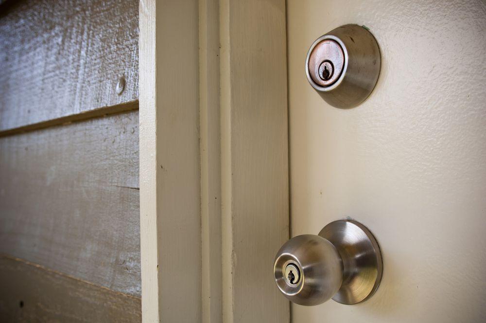 Details of a stainless steel door — Locksmith in Merrimac, QLD