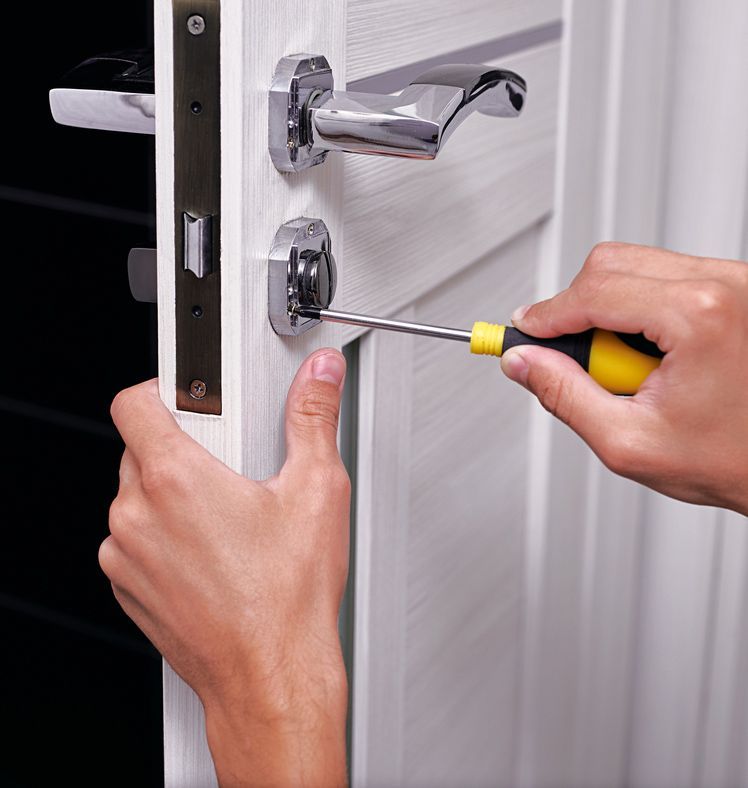 Locksmith Repairing the Door Lock in the Room in Mermaid Beach, QLD