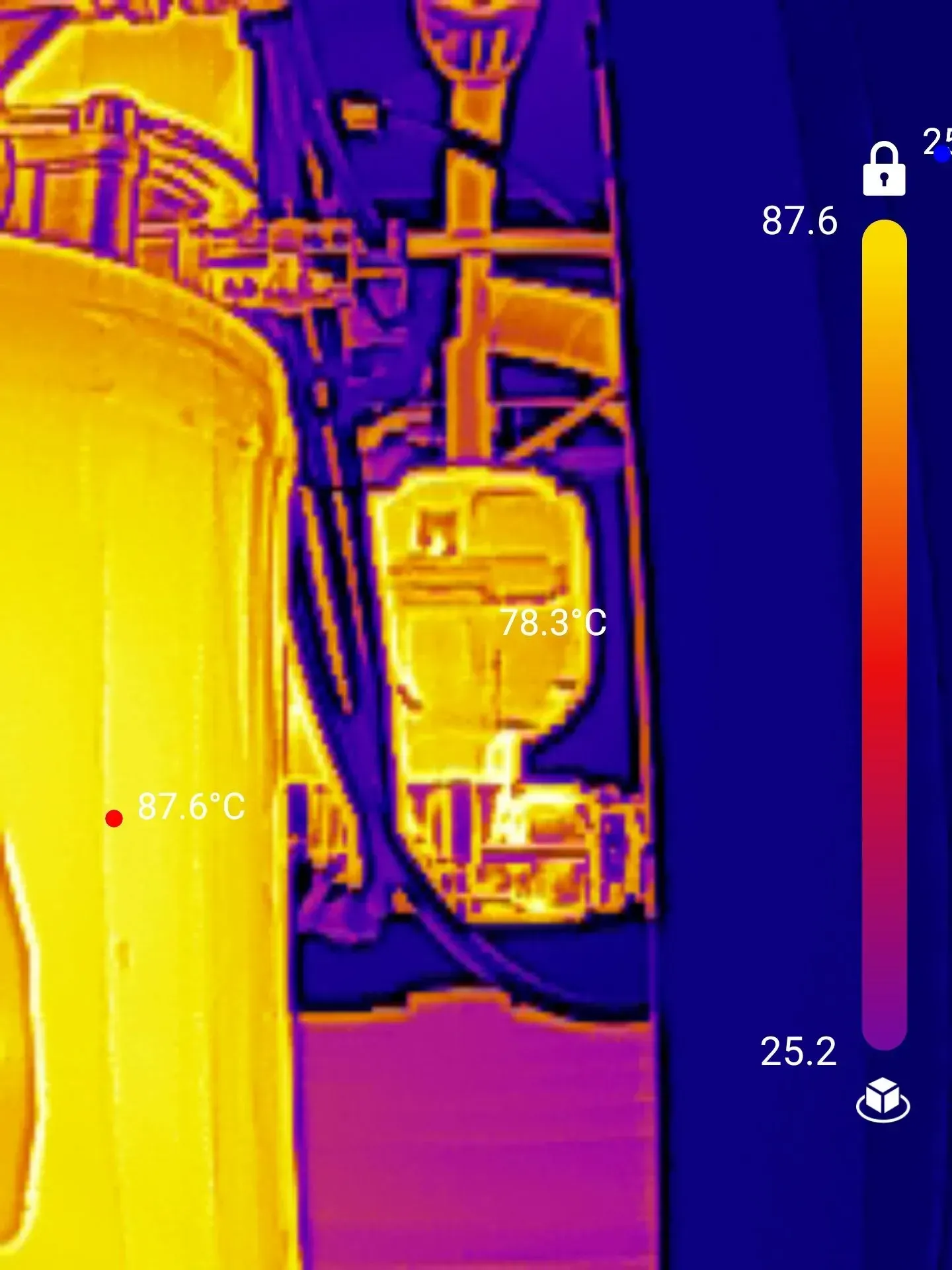 Thermal image of machinery showing heat levels; yellow represents hottest areas, purple the coolest.