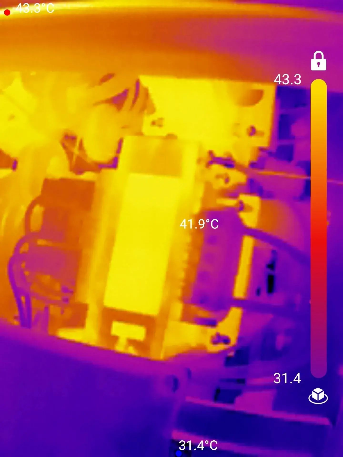 Thermal image of electrical components showing heat distribution, ranging from purple (cool) to yellow/red (hot).