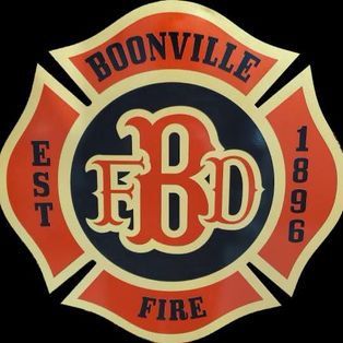 Boonville Fire emblem with red and gold Maltese cross, “EST 1896,” and stylized “EFD” in the center