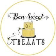 Bea Sweet Treats logo with a yellow cake on a stand inside a gold circle