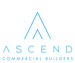 ASCEND Commercial Builders logo in blue with stylized roof lines