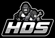 A gorilla is holding a wrench and a cell phone.