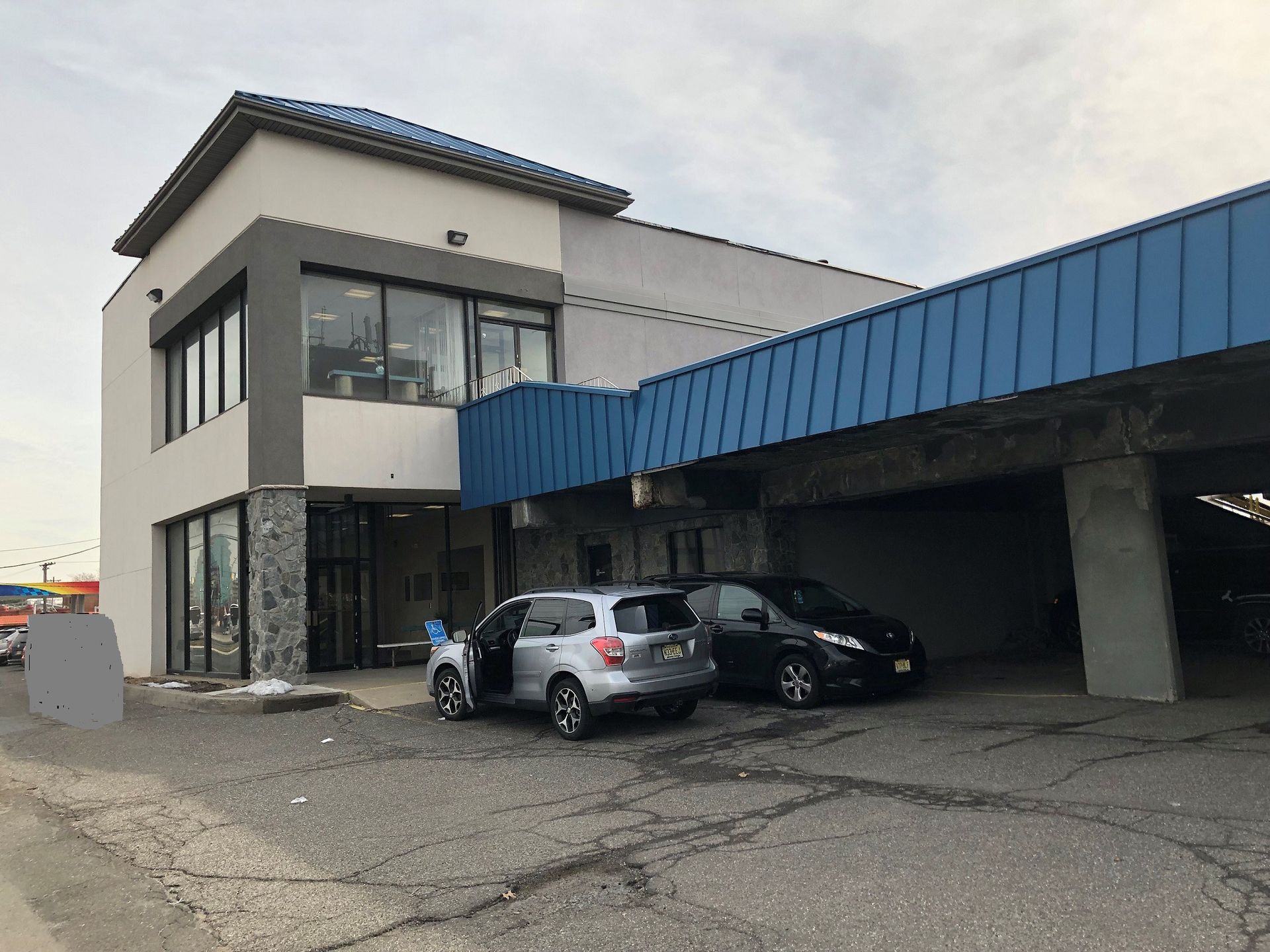 Picture Of Two Cars Parked — Clifton, NJ — Evergreen Commercial Real Estate Brokers Inc