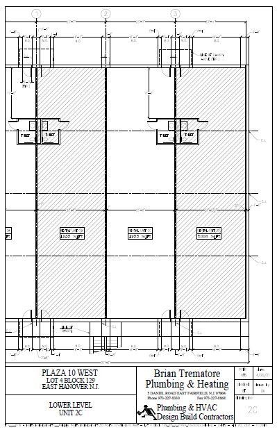 Lower level architectural plan with shaded areas, labeled 