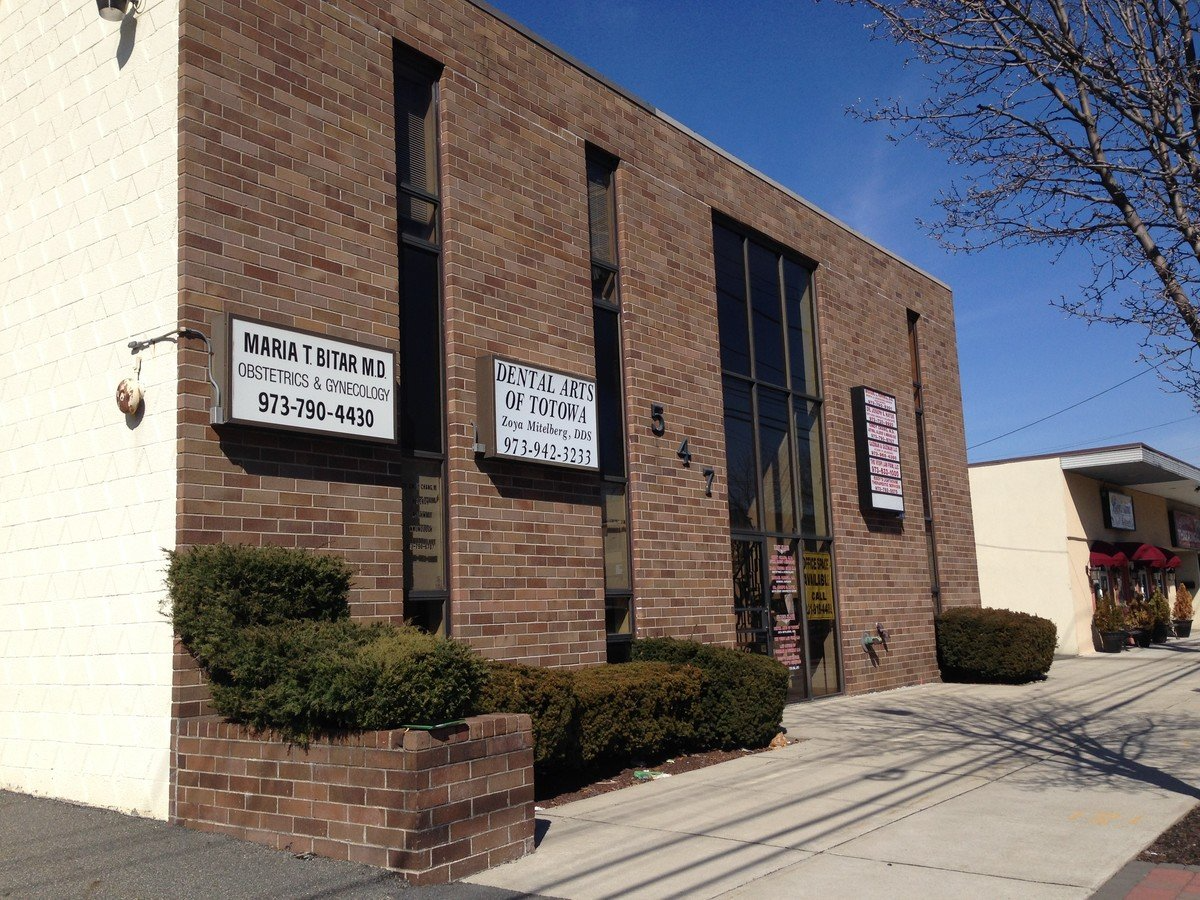 Brick building with signs: 