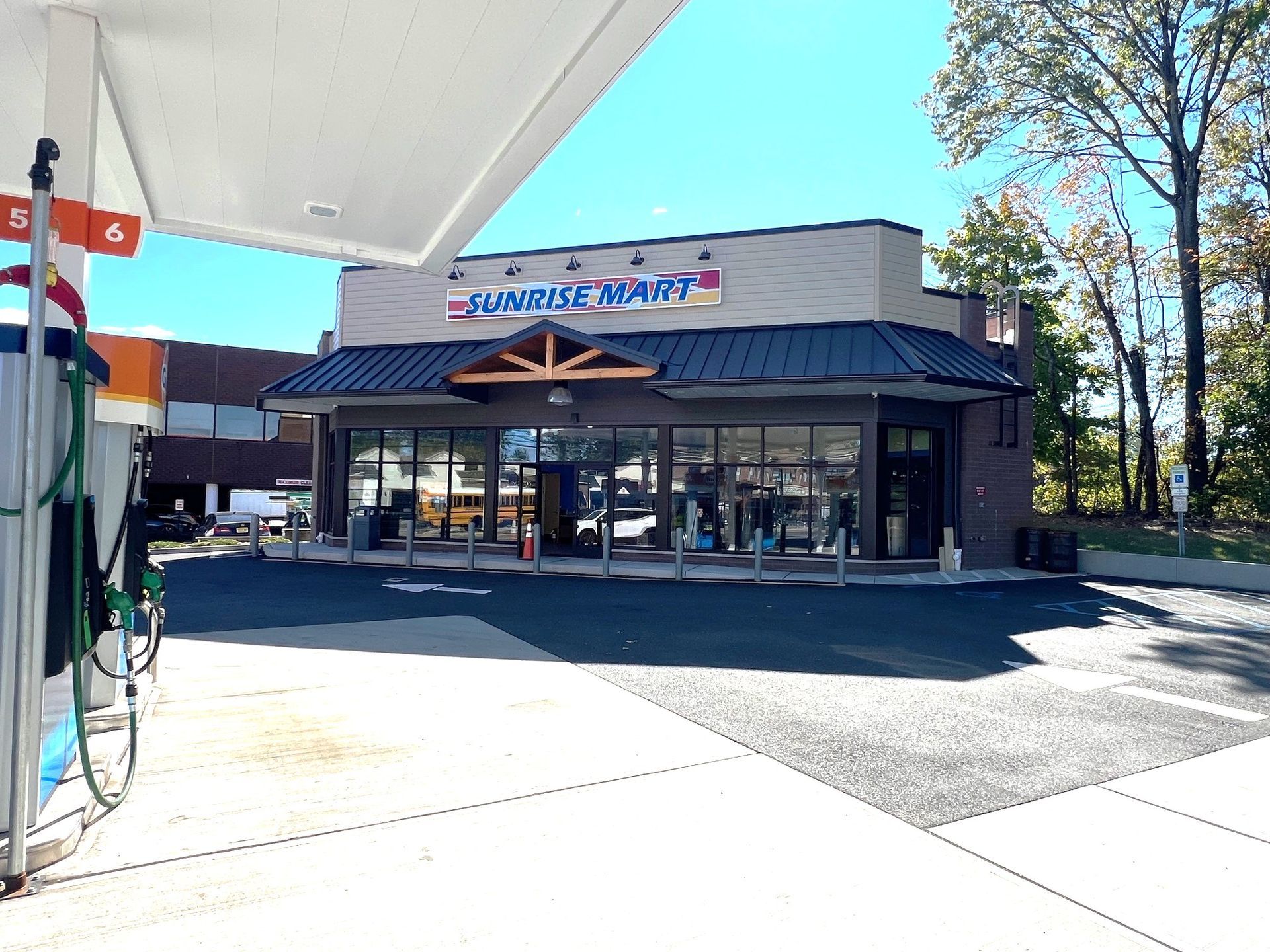 A gas station with a sign that says sunrise express