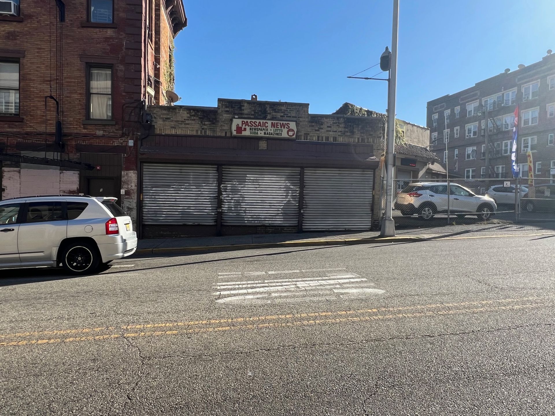 Car Parked In Front Of Building - Clifton, NJ - Evergreen Commercial Real Estate