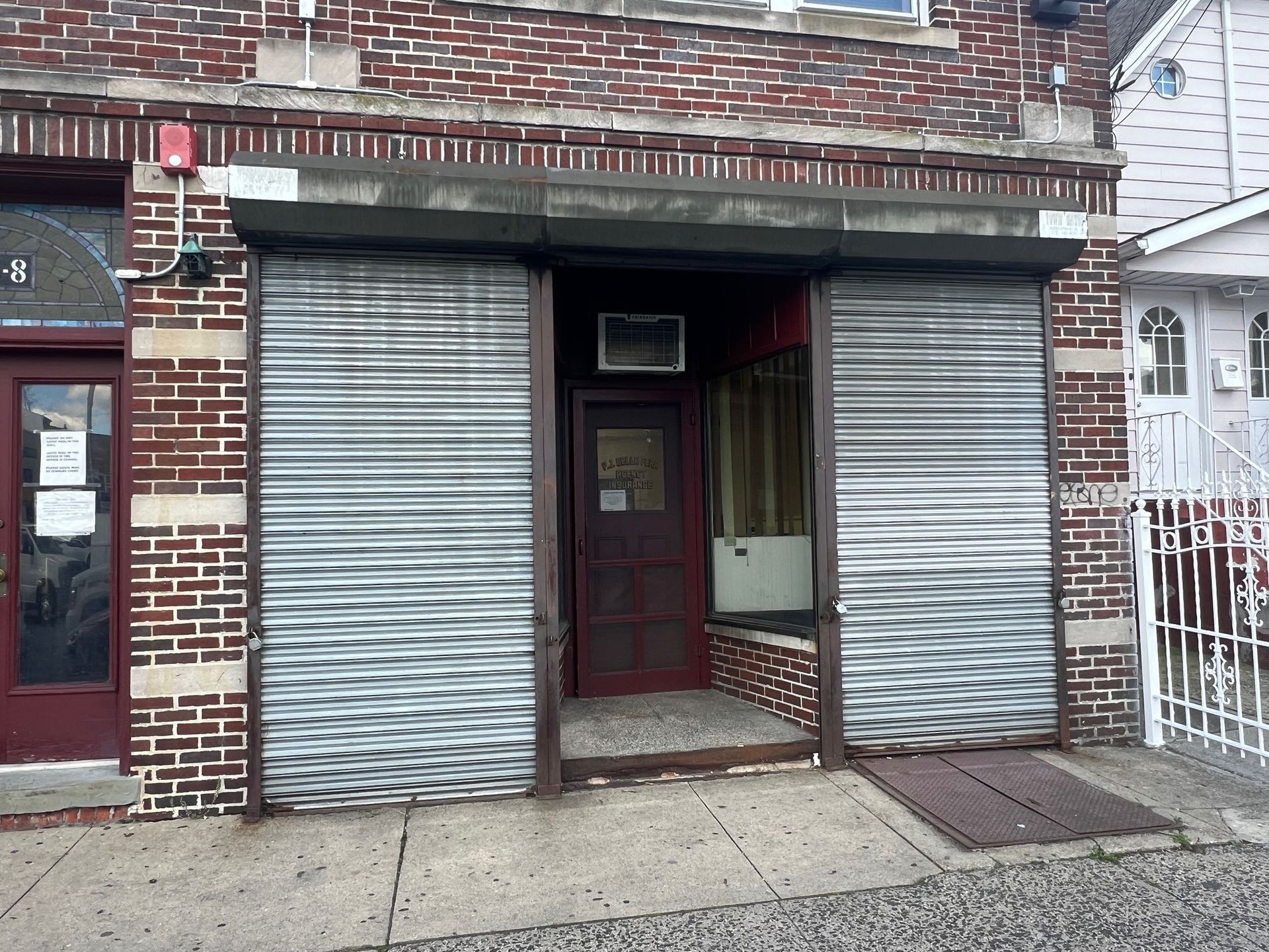 Building With Metal Shutter - Clifton, NJ - Evergreen Commercial Real Estate