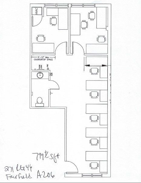 Floor plan of an office space with cubicles, restrooms, and a reception area.