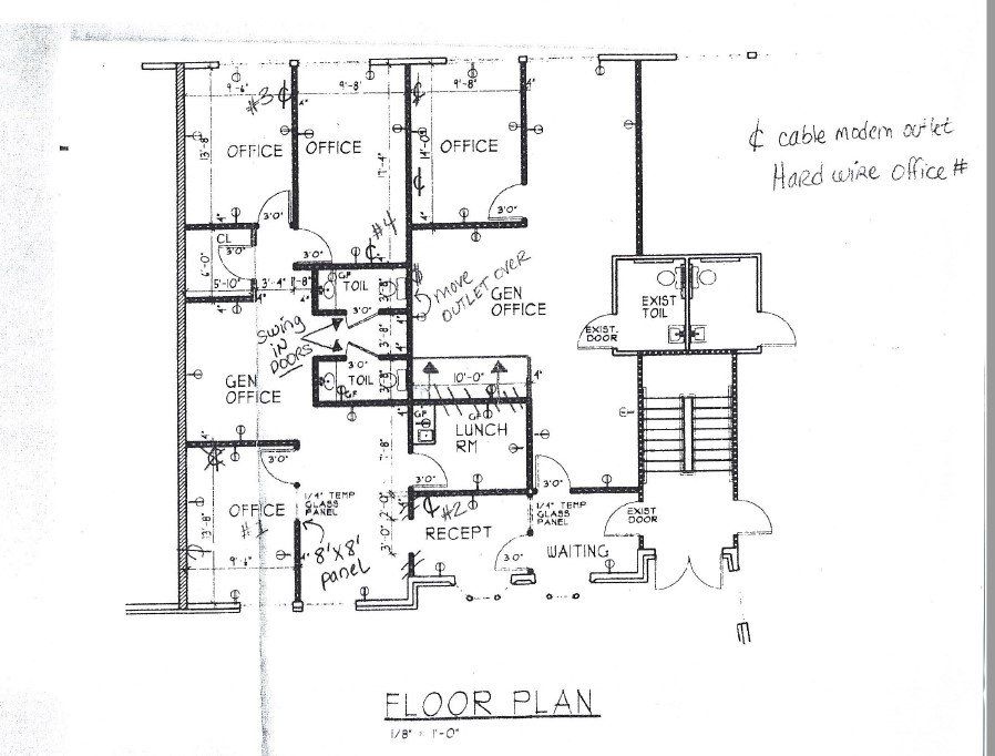 Floor plan of an office layout with multiple rooms labeled as office, reception, lunch, and entry.