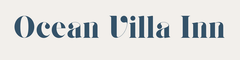 Ocean Villa Inn logo in a muted blue font on an off-white background.