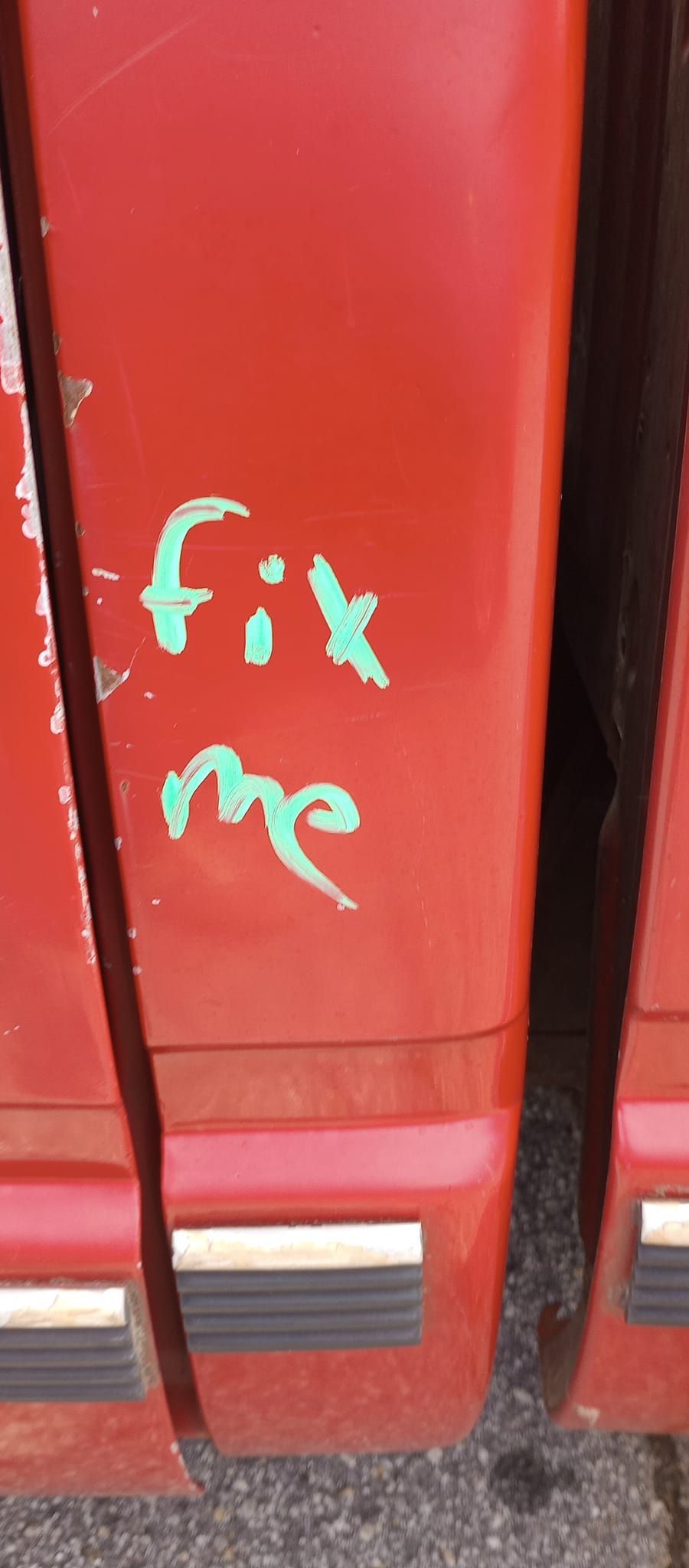 A red container with the words `` fit me '' written on it.