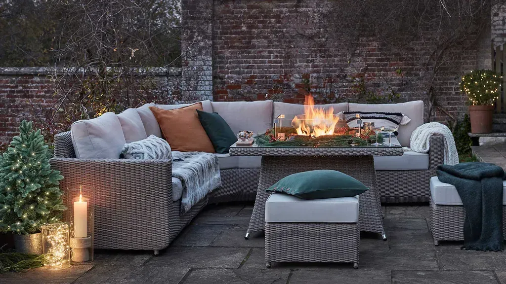 There is a fire pit in the middle of the patio.-Crowders Landscaping