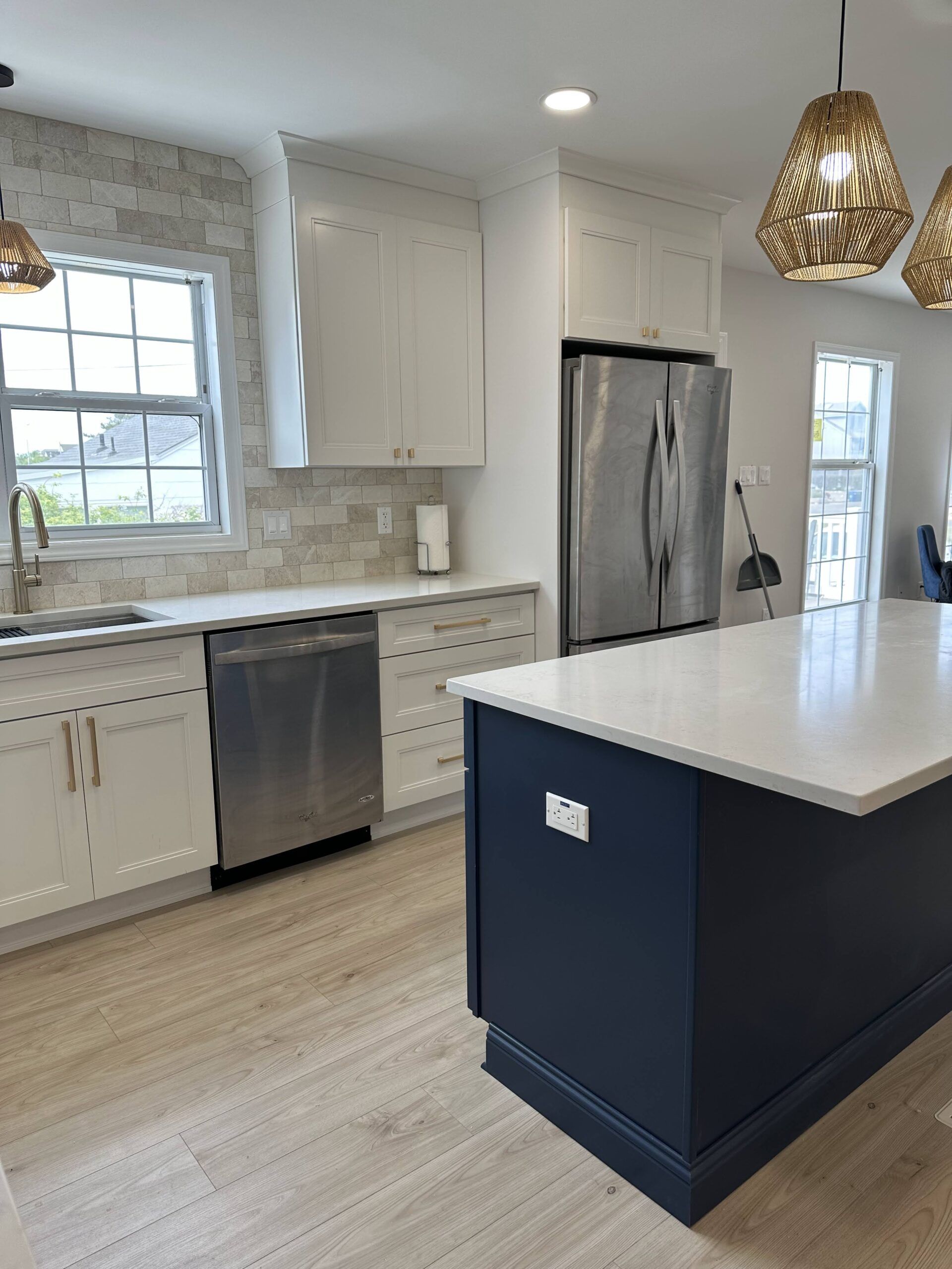 There is a large island in the middle of the kitchen.
