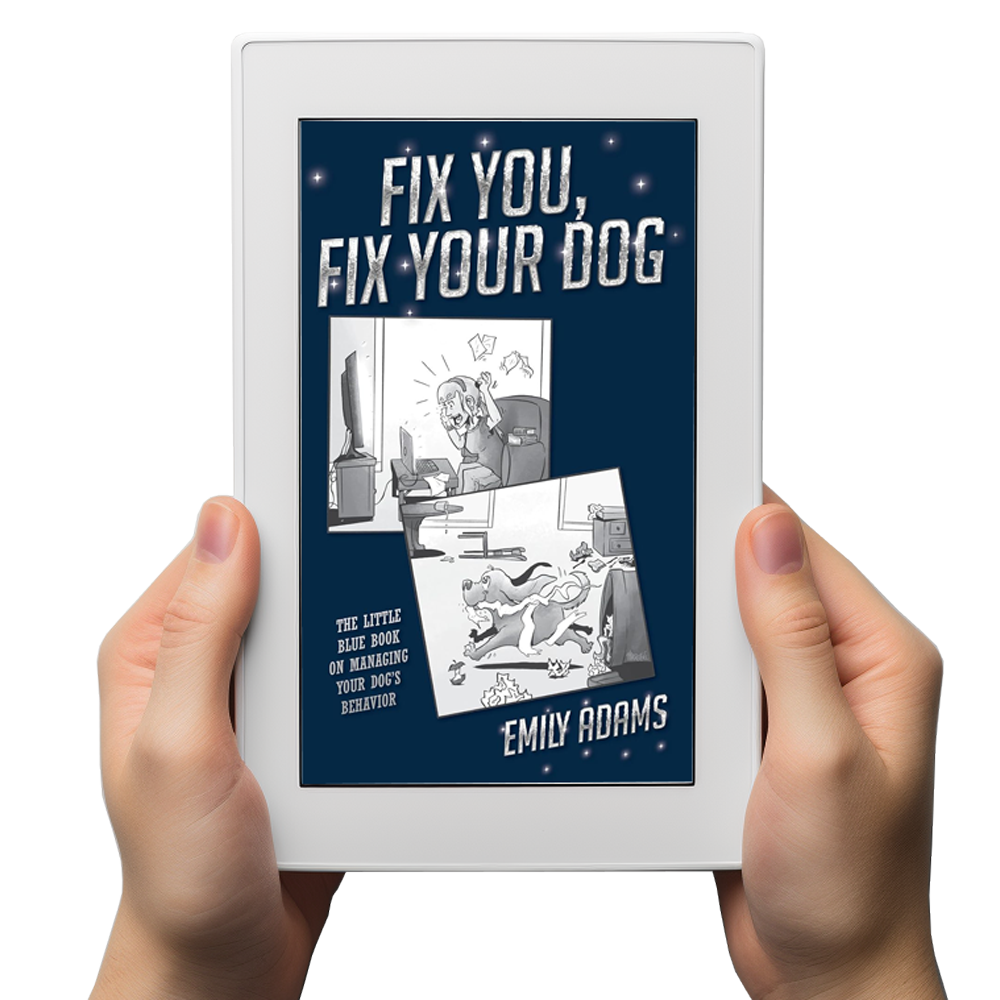 Hands holding a white tablet displaying a dark blue book cover titled “Fix You, Fix Your Dog” by Emily Adams.