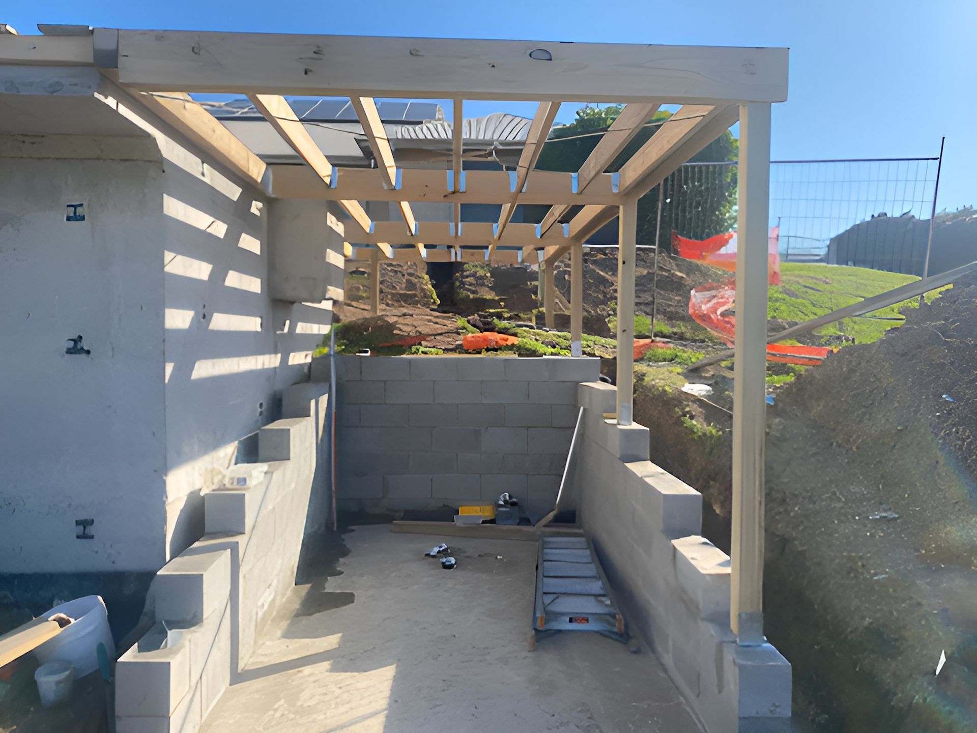 A Wooden Structure is Being Built on the Side of a Building — East Maitland Building In Tenambit, NSW