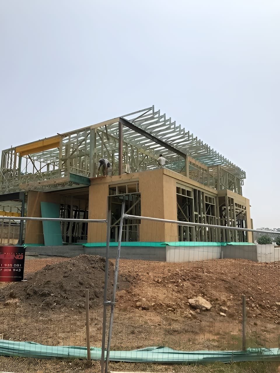 A House is Being Built in the Middle of a Dirt Field — East Maitland Building In Port Stephens, NSW