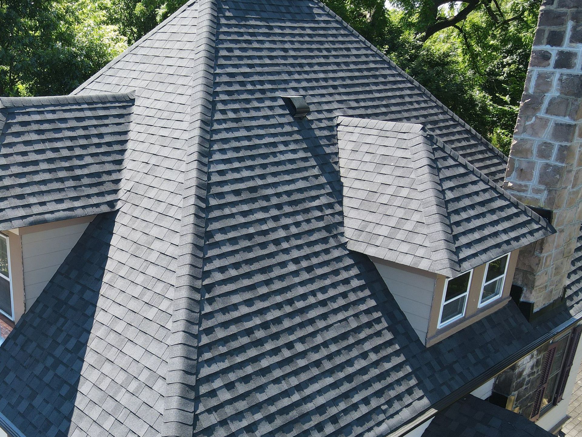 Aerial photo of house after roof replacement