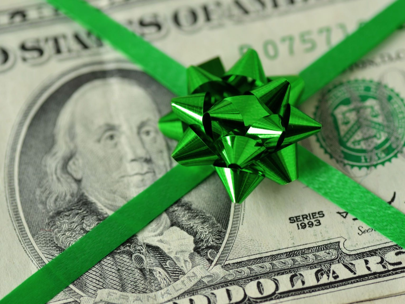 A photo of cash bonus gift from Essential Exteriors.