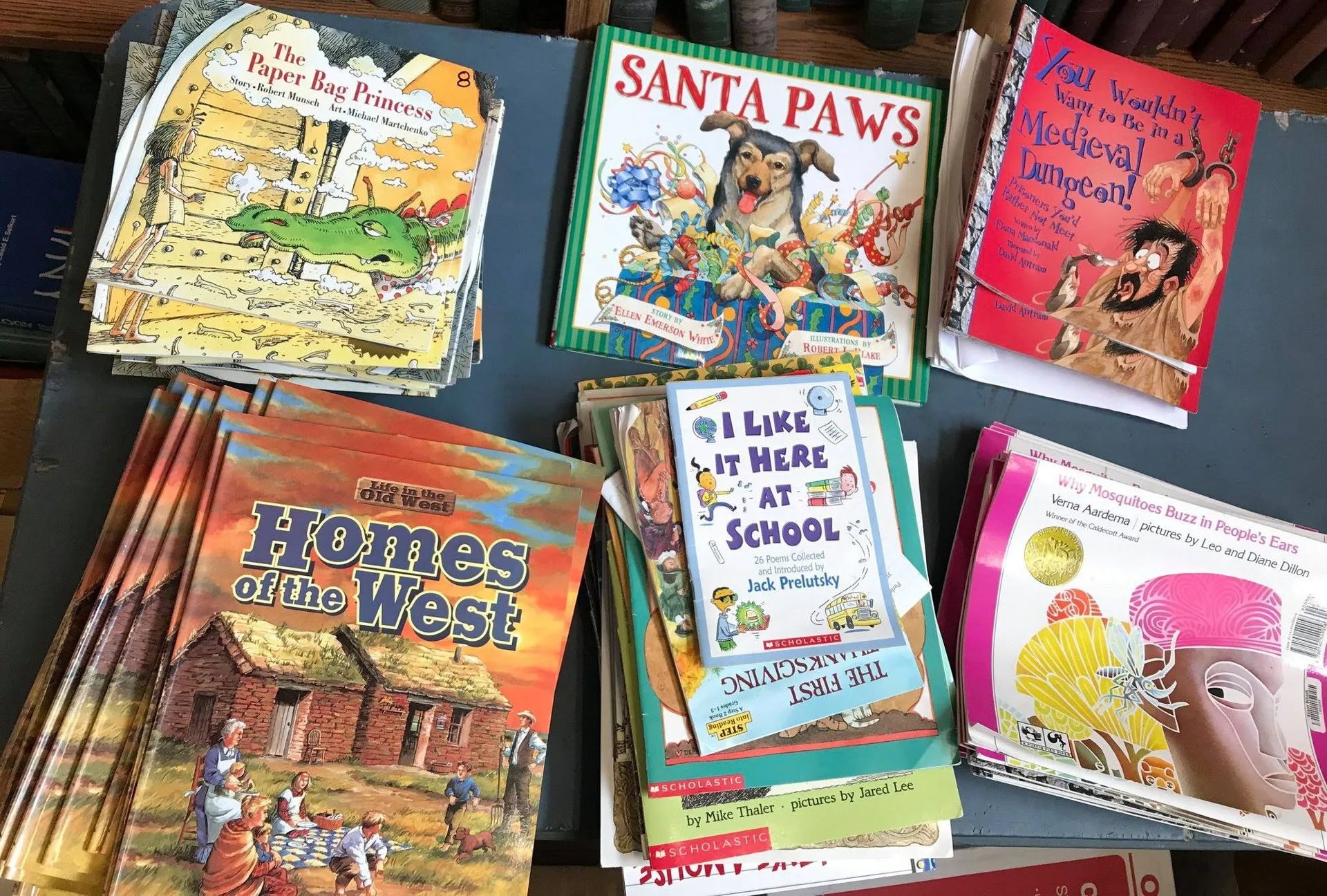 Pile of colorful children's books, including 