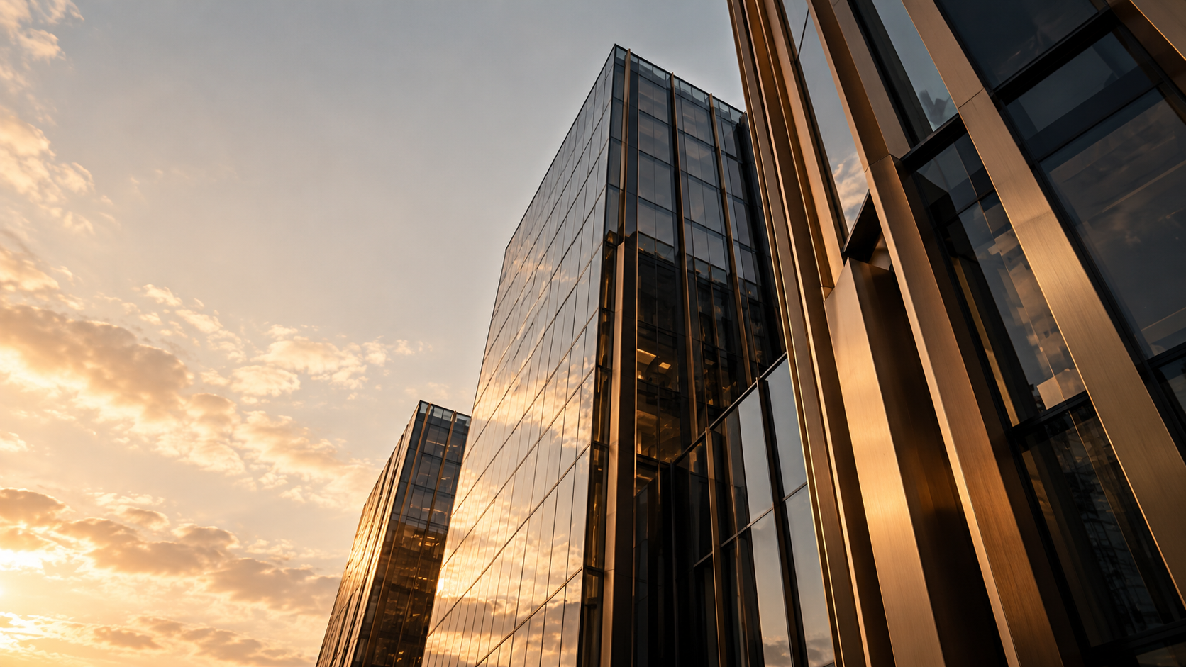 Glass and bronze architecture catching the evening light