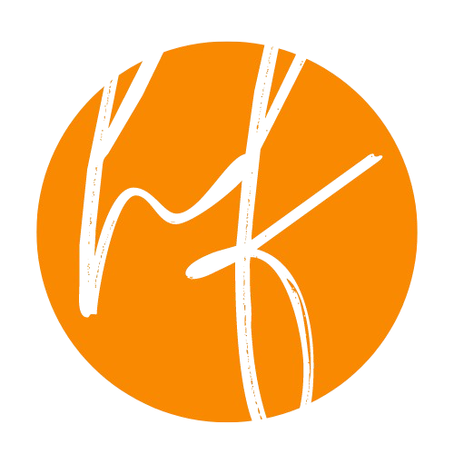 An orange circle with the letter k on it