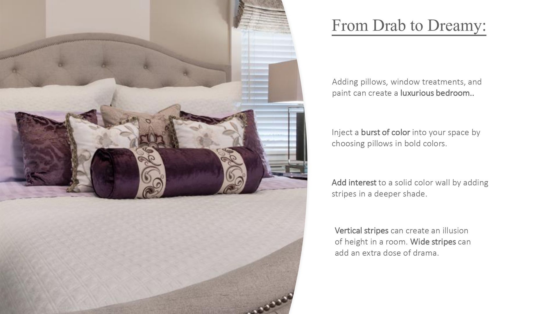 A bed with purple pillows and a purple headboard in a bedroom.
