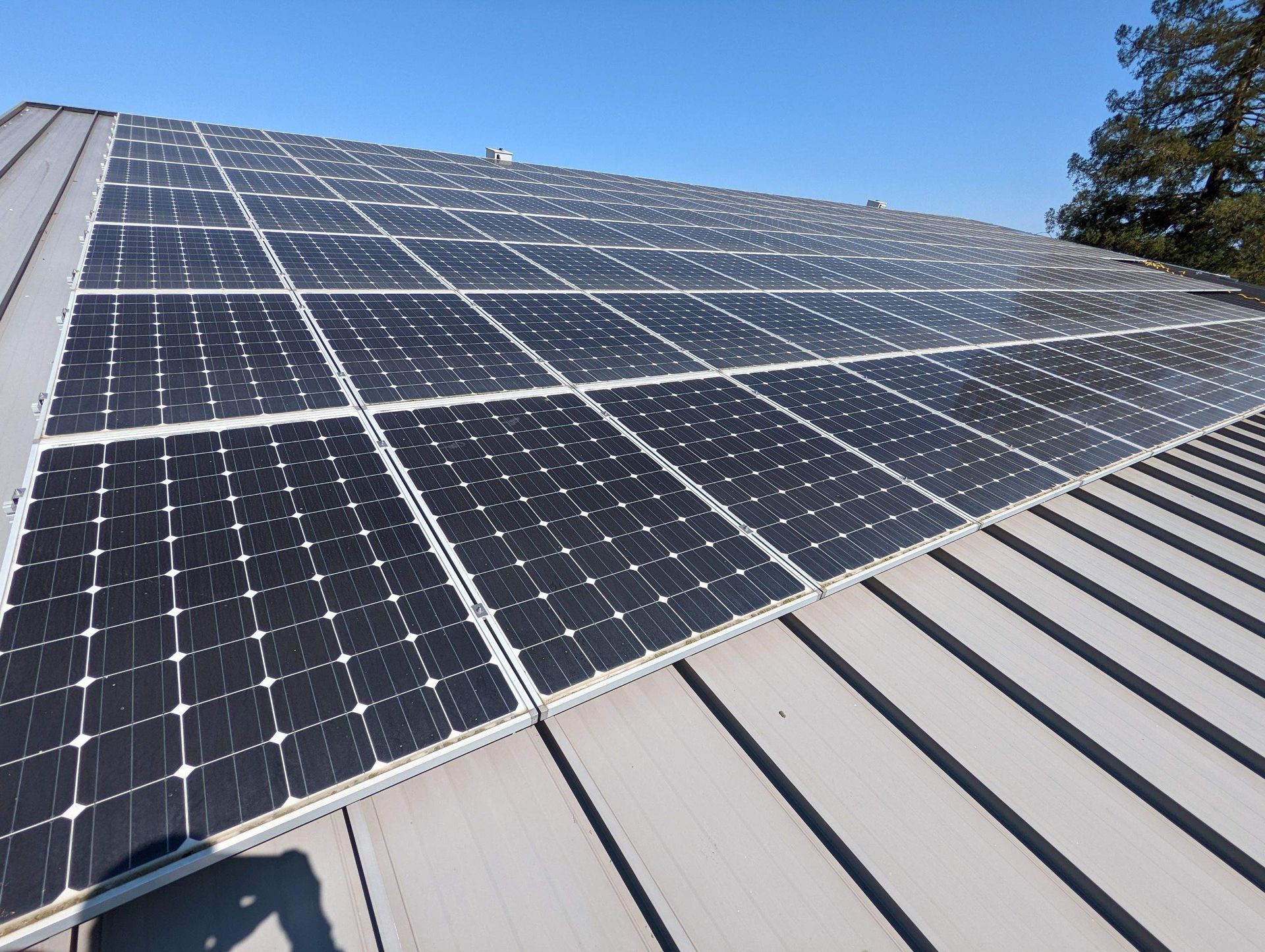 A Roof with a Lot of Solar Panels — Sacramento, CA — All One Solar Shine